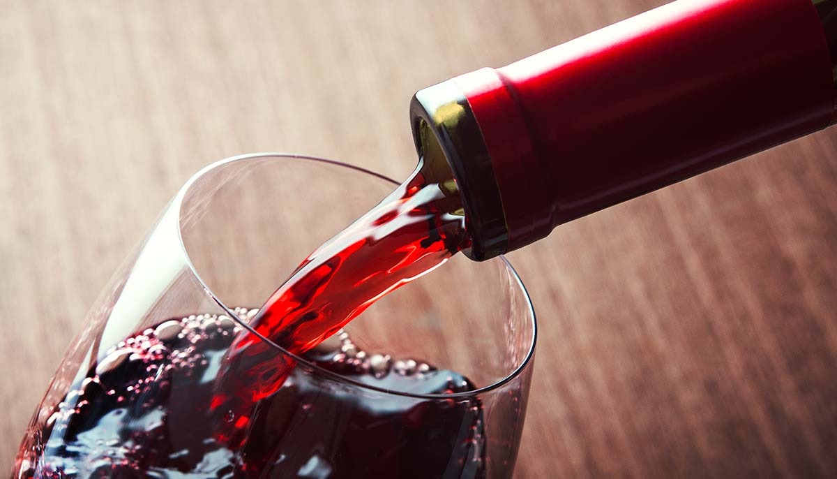 Red Wine being poured into a glass