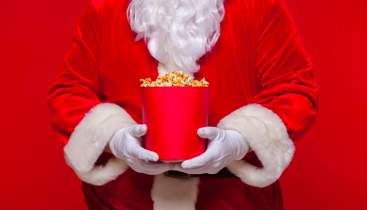 Santa holding popcorn