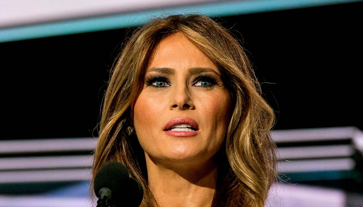 Melania Trump addresses a crowd in an auditorium