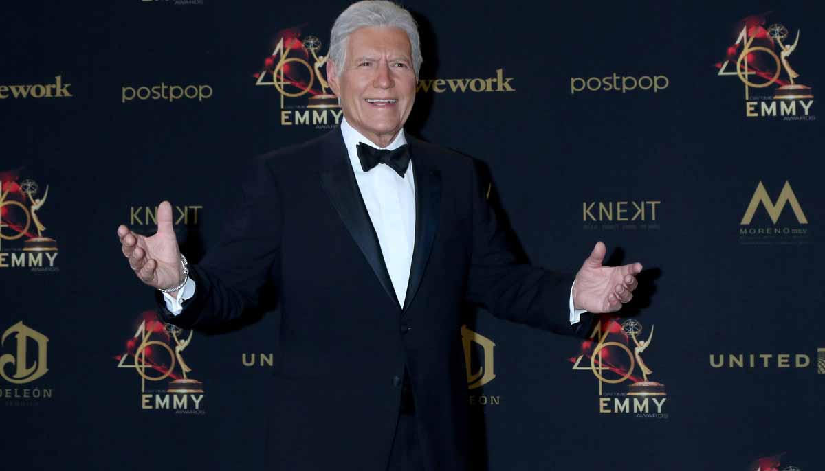 Alex Trebek poses for a photograph at an event