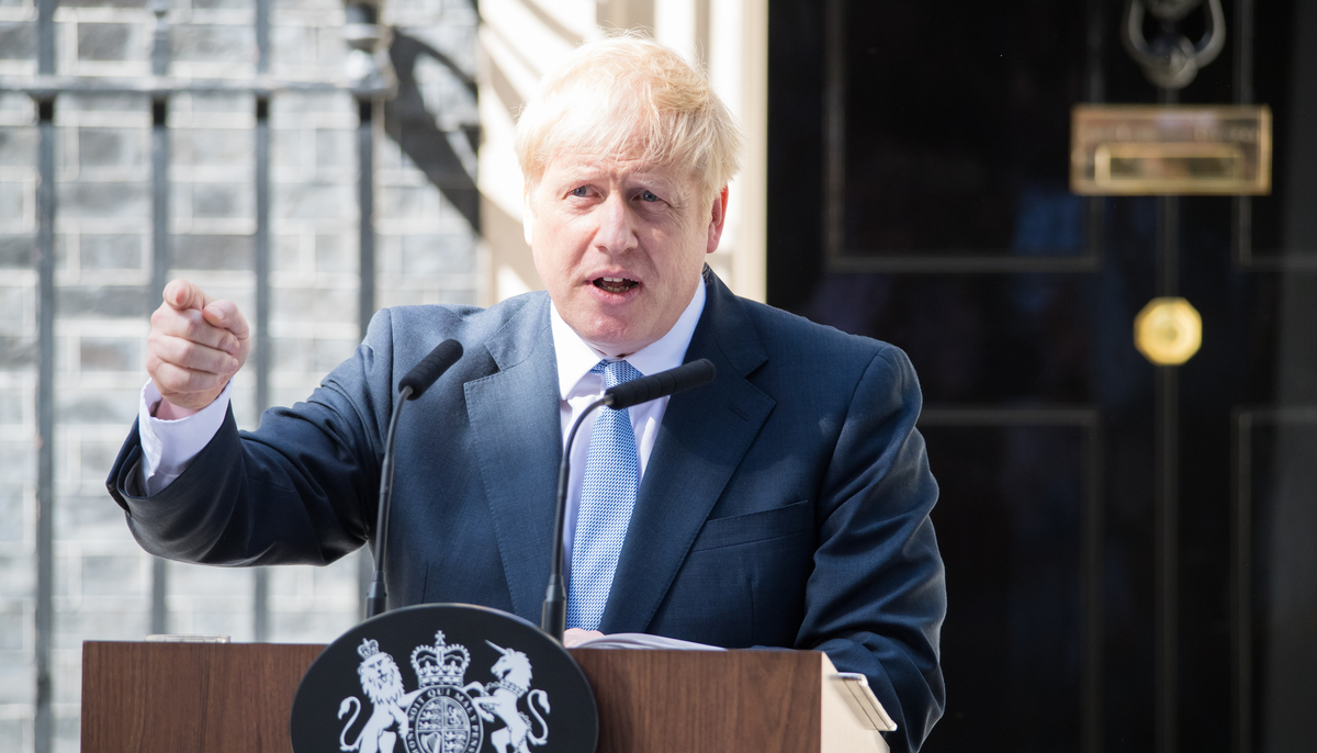 Boris Johnson addresses a crowd outside of Parliament