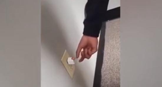 teen inserts coin into phone charger tiktok challenge