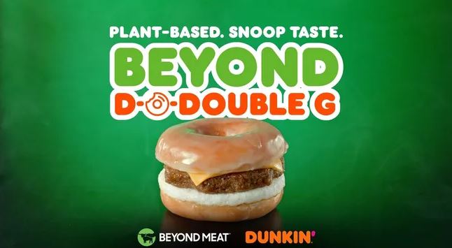 An advertisement for the beyond d o double g sandwich at dunkin donuts
