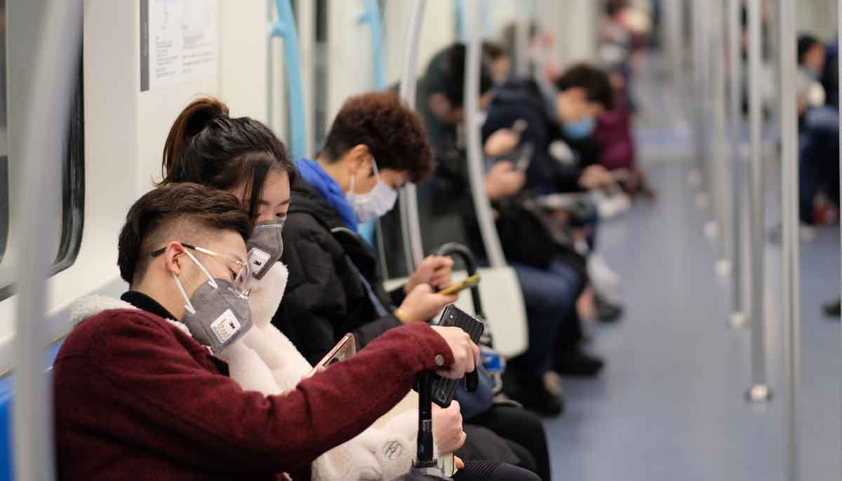 Passengers on a Chinese subway wearing surgical masks