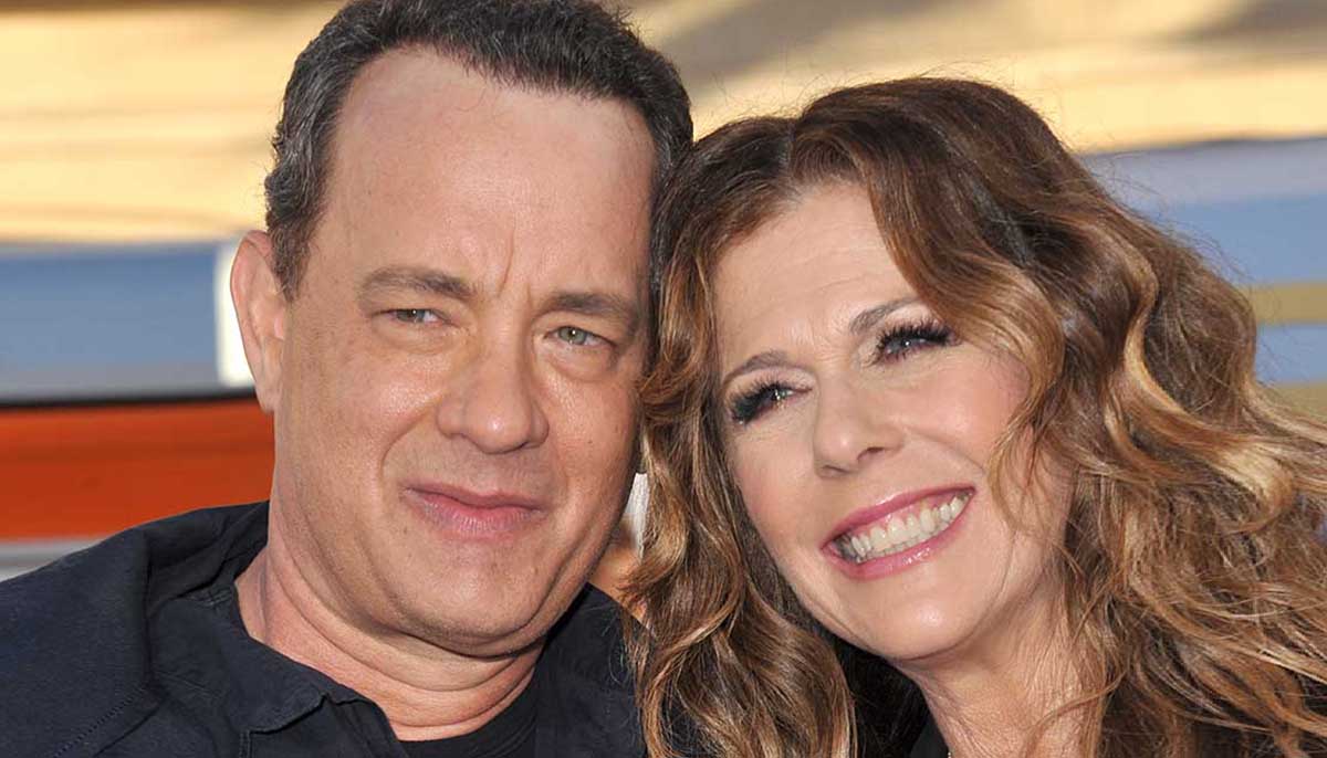 Tom Hanks and his wife Rita Wilson sit together