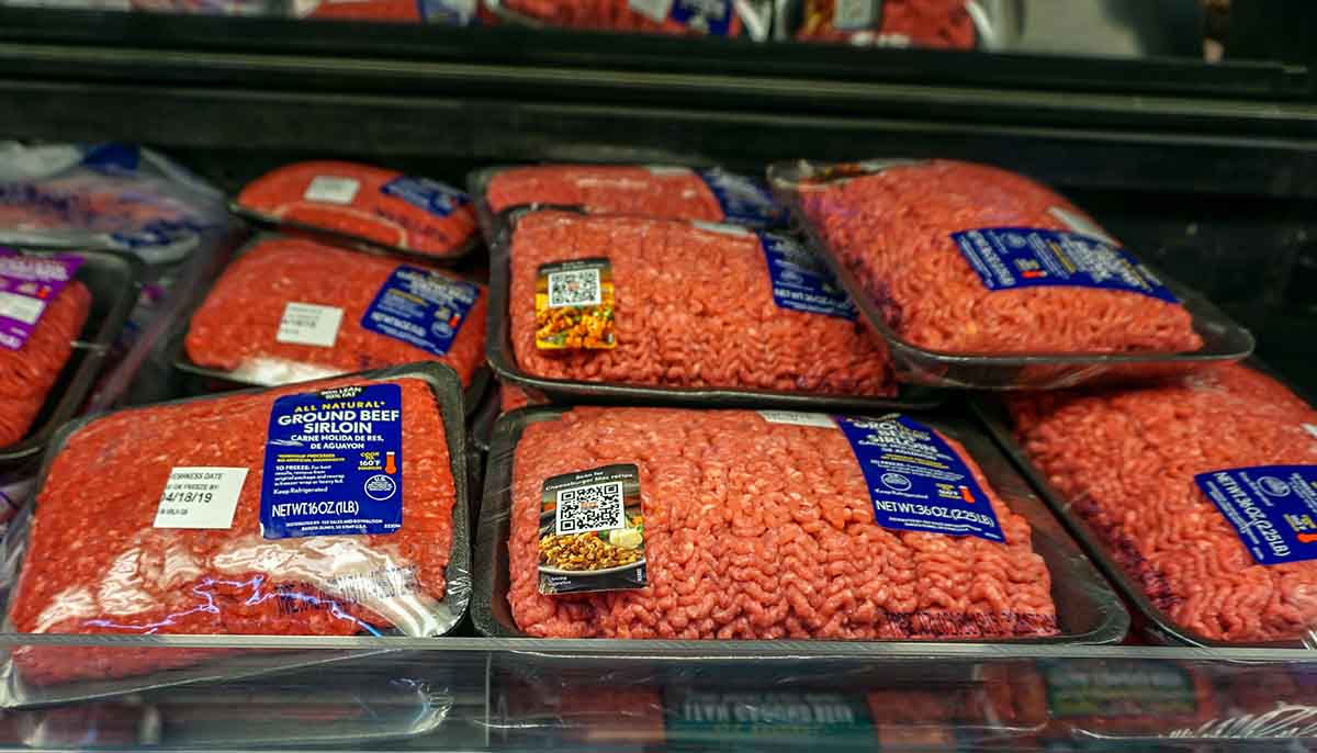 ground beef on display at a grocery store