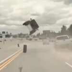 Car goes airborne on LA freeway in wild video and more news